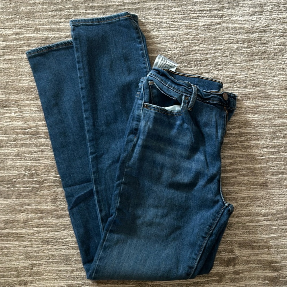 Levi jeans, style 724 size 29 in dark/medium wash.